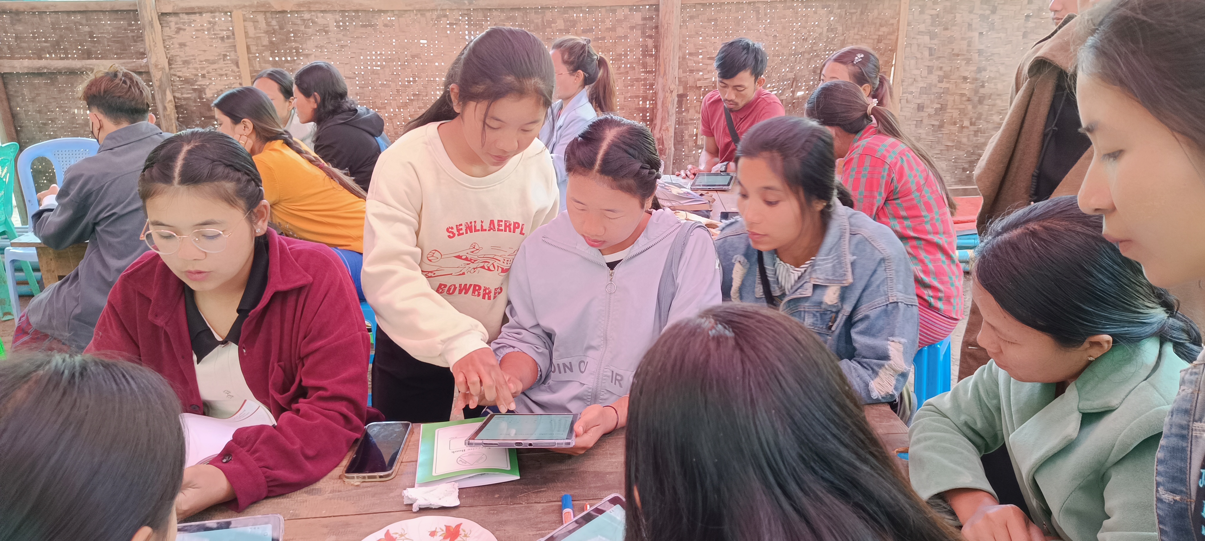 Students using tablets for learning